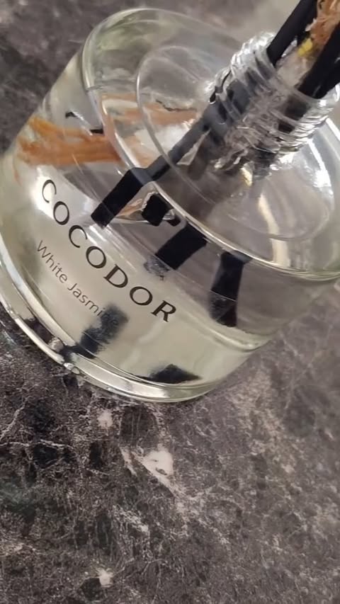 Instagram post by @dazzlesbyjay for Cocodor. Caption reads: [...] scent of white jasmine. This @cocodor.global....