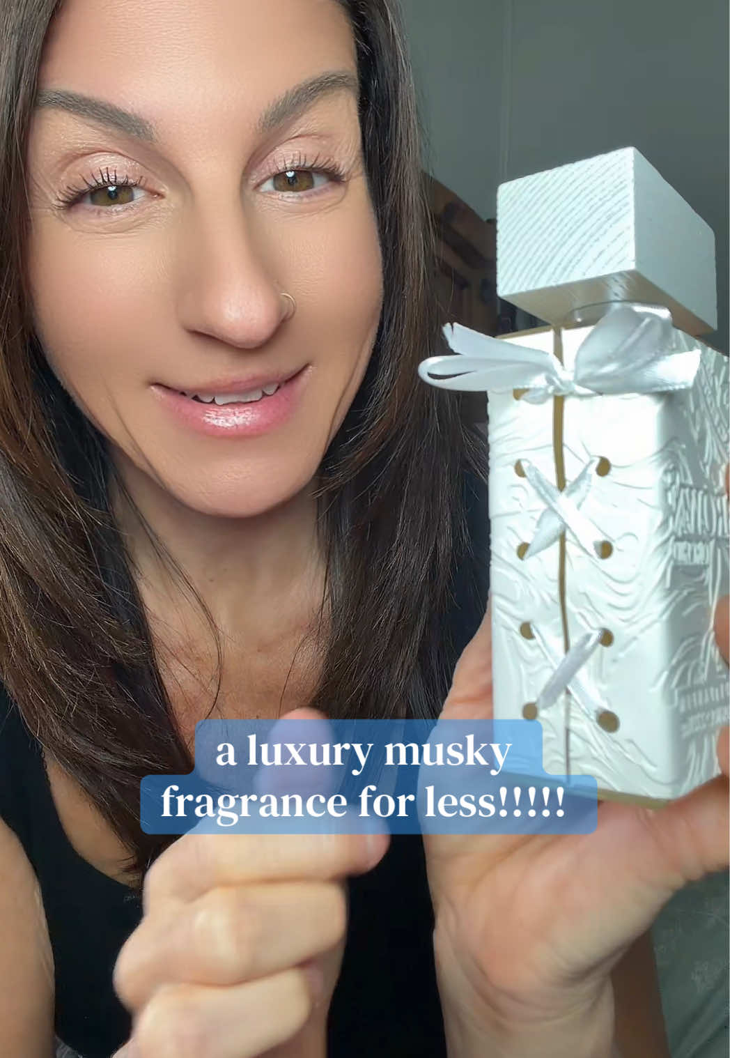 TikTok post by @kristenmariefam for Oudware. Caption reads: Aroma Paris - Brown Orchid - @Oudware....