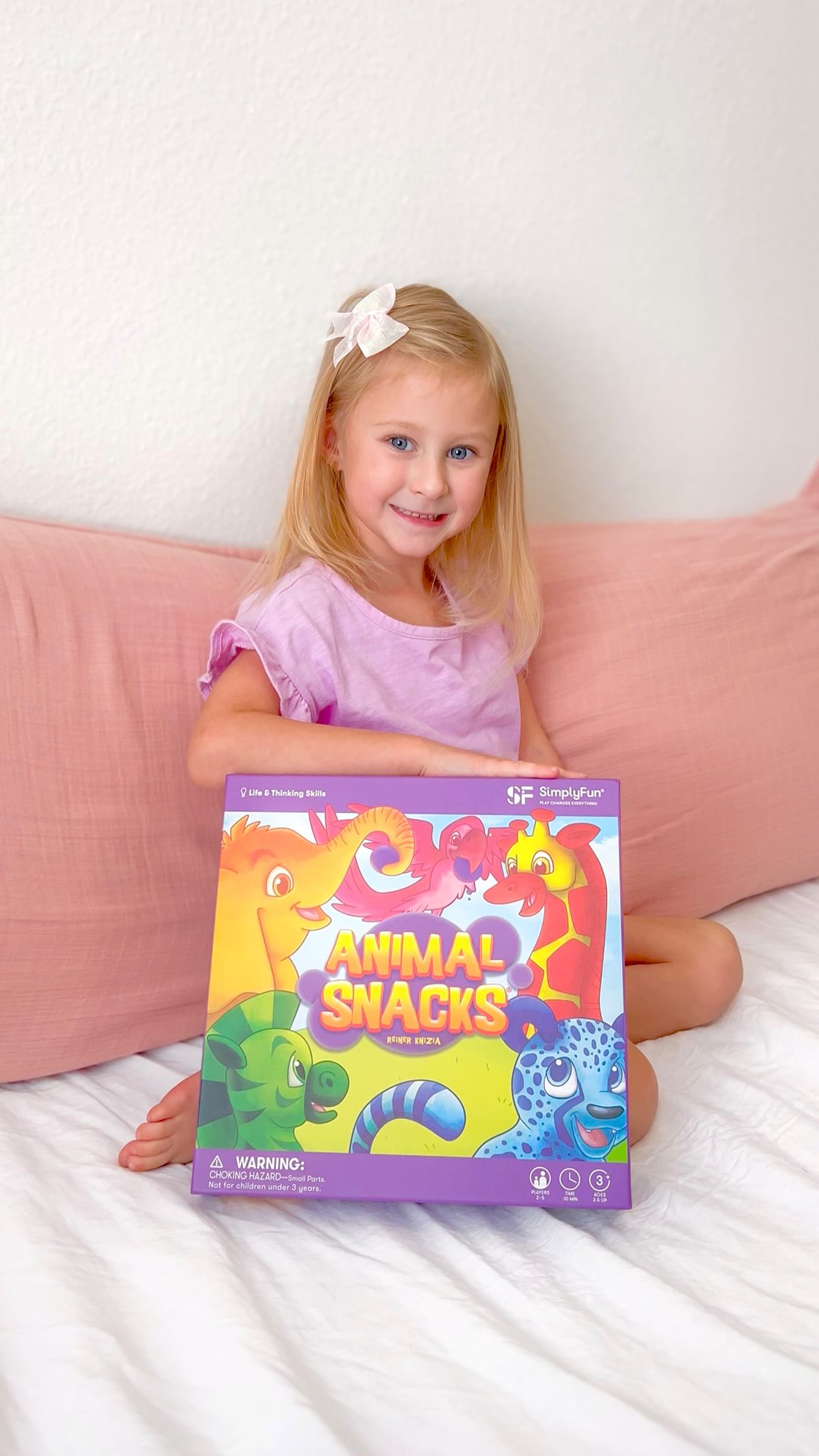 Instagram post by @idkivy for SimplyFun. Caption reads: #ad @simplyfun family game dayyy💞 with our fav....