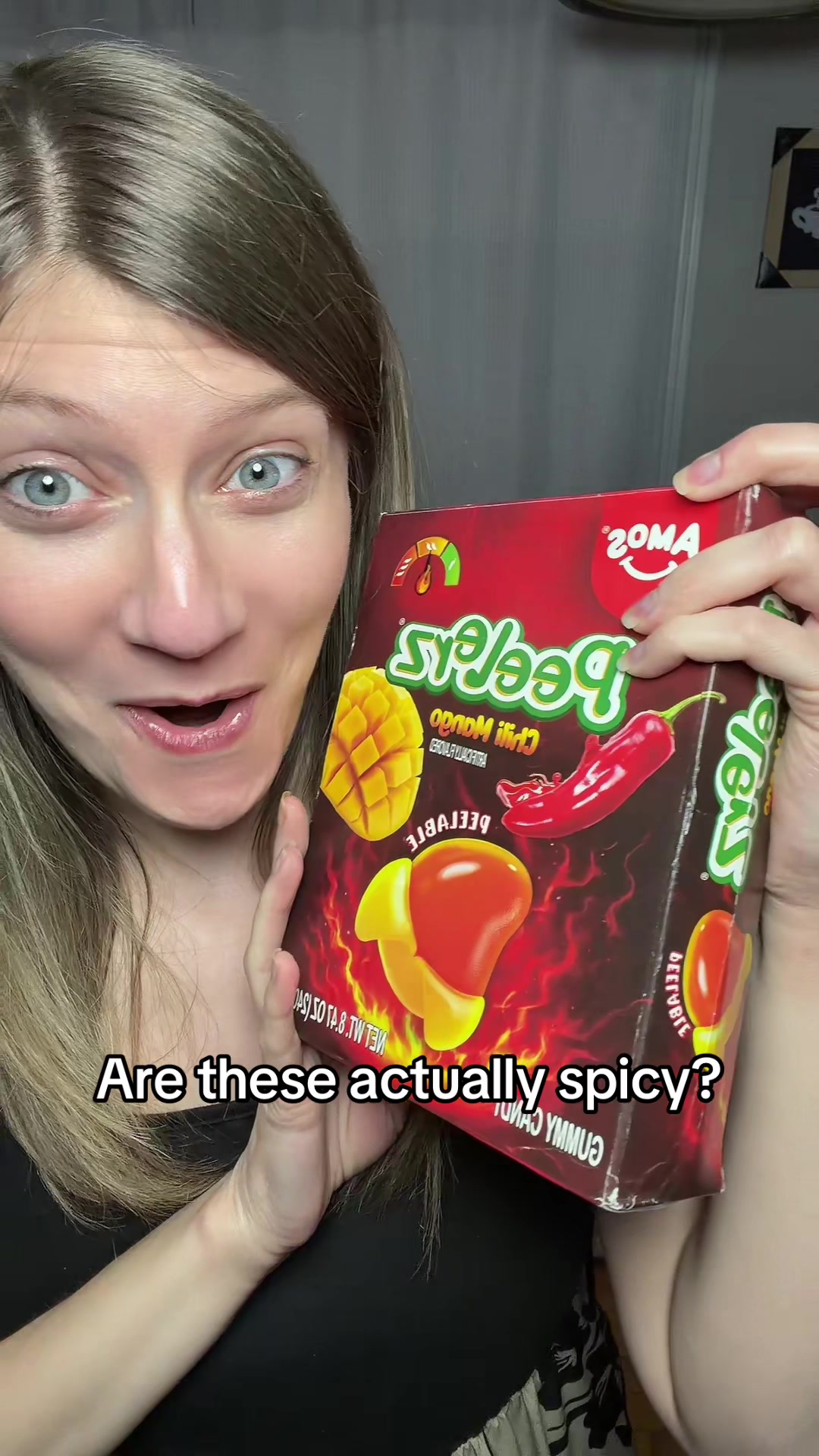 TikTok post by @amanda.aligned for Amos Sweets. Caption reads: [...] #tastetest #gummies #snacks @Amos Sweets.