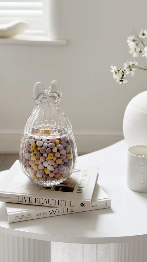 Instagram post by @cxurtniehome for The Range. Caption reads: [...] Ribbed Bunny Glass Jar – Clear from....