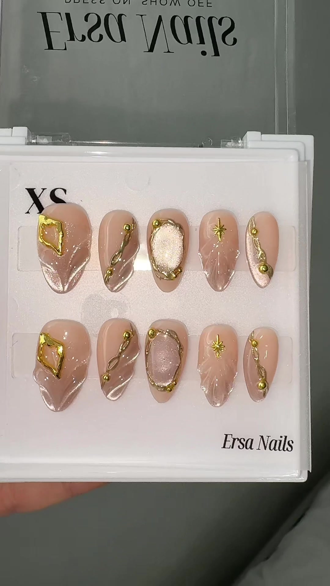 TikTok post by @vio1etann for Ersa Nails. Caption reads: thank you @Ersa Nails #nails #pressonnails....