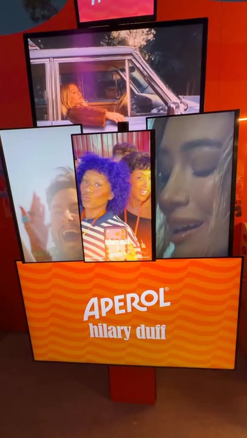 Instagram post by @domrobxrts for Aperol Spritz. Caption reads: [...] on her Lucky Me Tour!! thank you....
