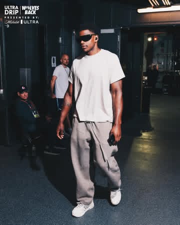 Instagram post by @timberwolves for Michelob ULTRA. Caption reads: shades on. he’s ready. 😎.