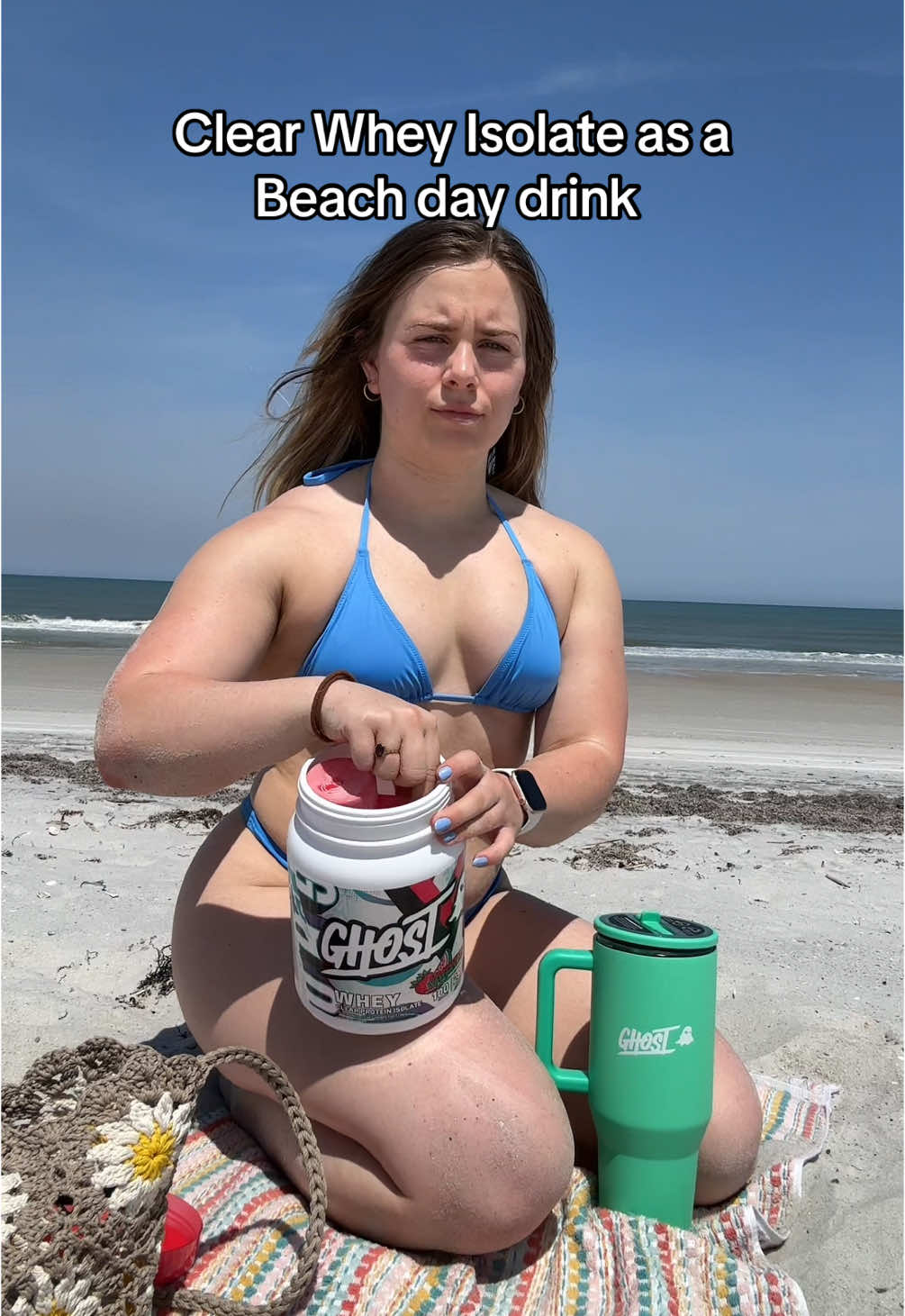 TikTok post by @themusclemami for GHOST LIFESTYLE. Caption reads: #ad Refreshing way to get my protein in-....
