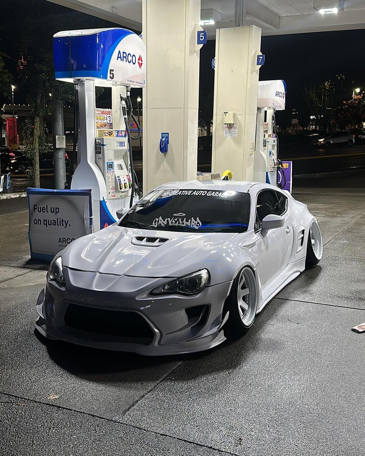 Instagram post by @faketaxi.frs for RAXTiFY. Caption reads: [...] 
Wrap by....