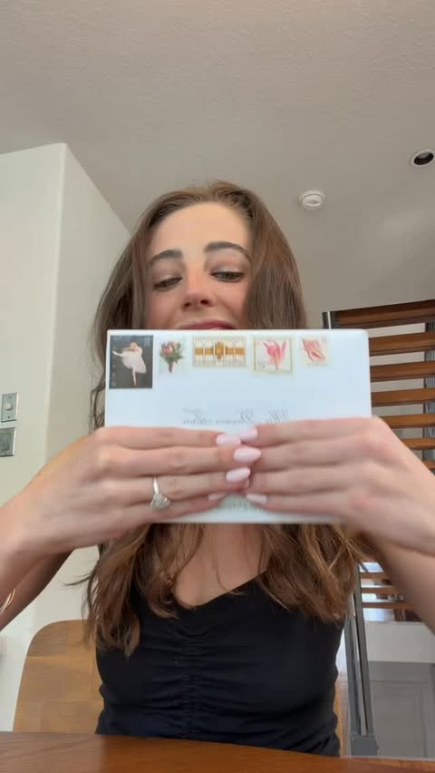 Instagram post by @eli.rallo for ZOLA. Caption reads: opened our wedding invitations from @zola and....