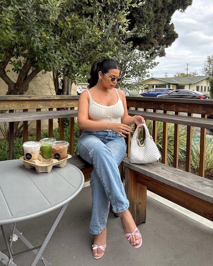 Instagram post by @kimberlygonzlz for JustFab. Caption reads: matcha & kitten heels my 2 favorite things....