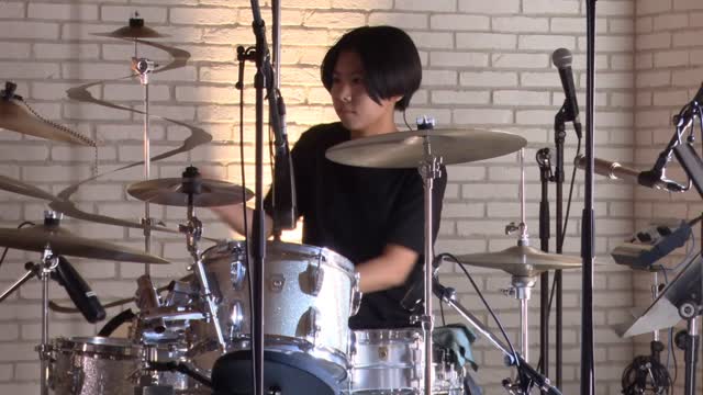 Instagram post by @chihirope9 for Vic Firth. Caption reads: Here is my original song 'Hallo Sunshine' from the....