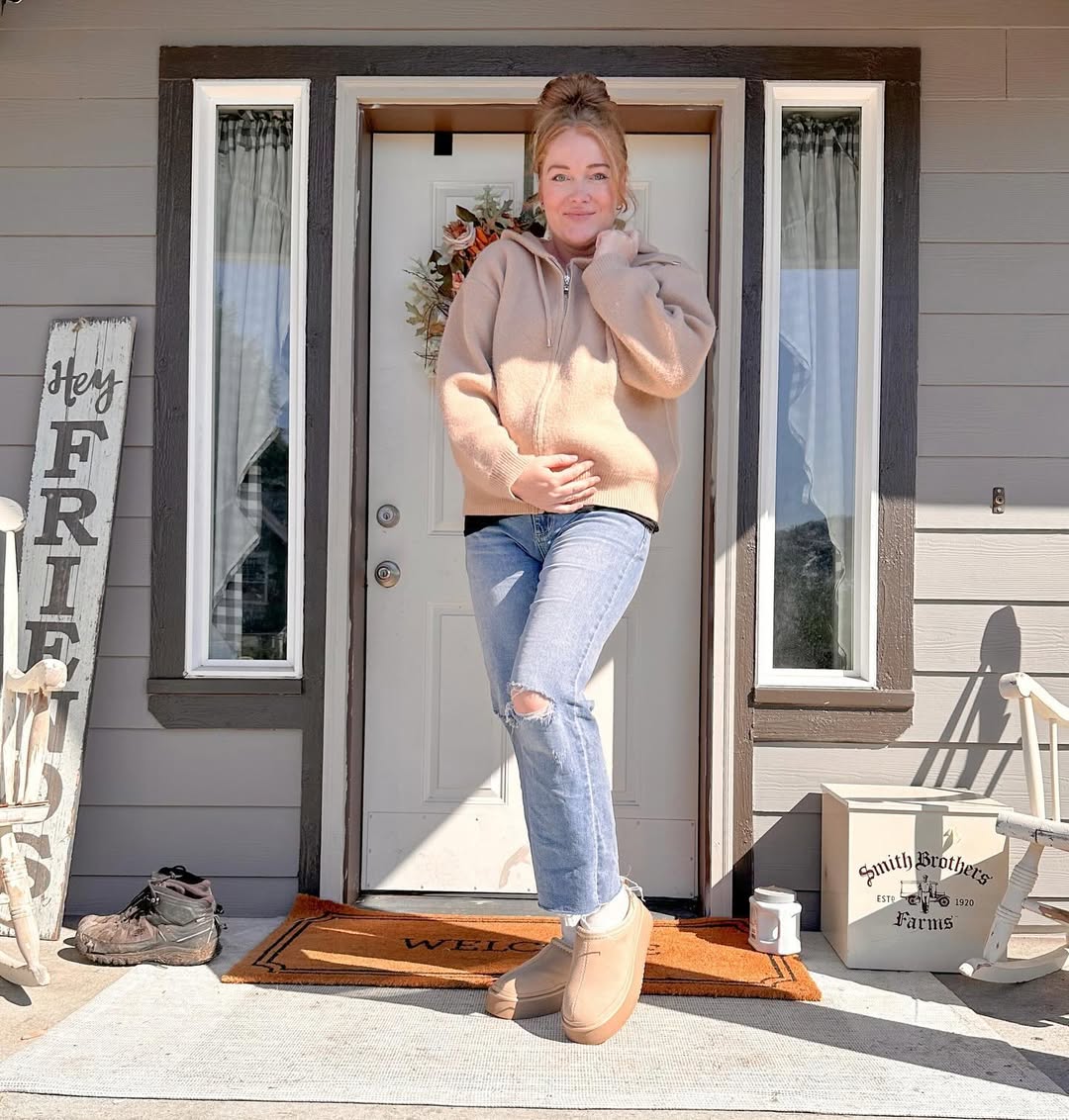 Instagram post by @taylormade_mama for PinkBlush Maternity. Caption reads: Entering cozy season with the bump 🤰🤍 oversized....