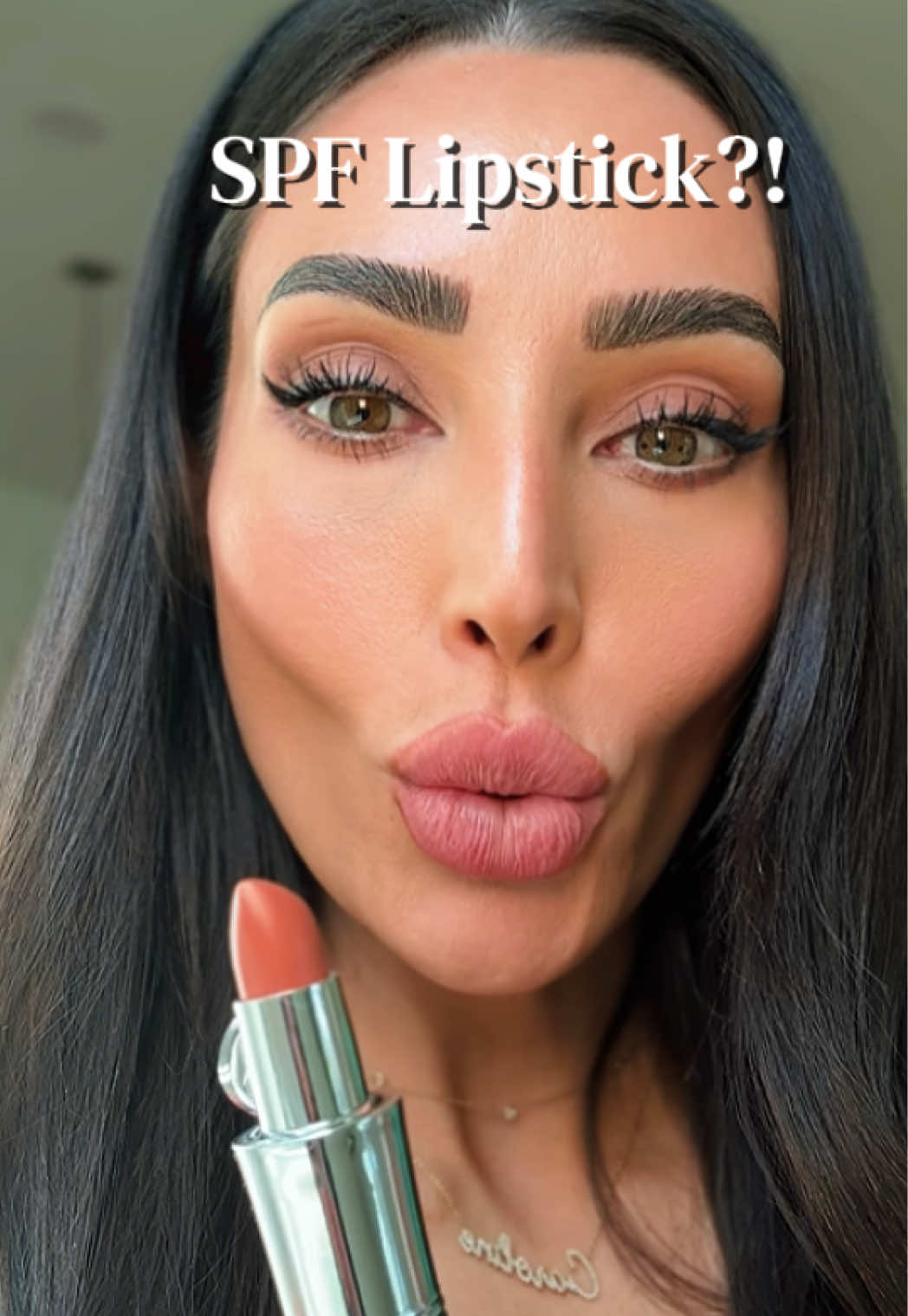 TikTok post by @carejohnston for KAPLAN MD. Caption reads: SPF 30 Smooches 💋 @KAPLAN MD BEVERLY HILLS Color....