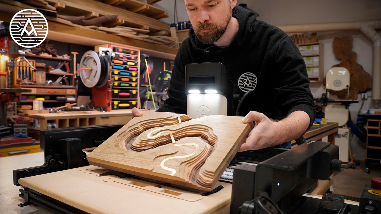 YouTube post by @MichaelAlm for Shaper Tools. Caption reads: Benchpilot: A CNC unlike any other!.