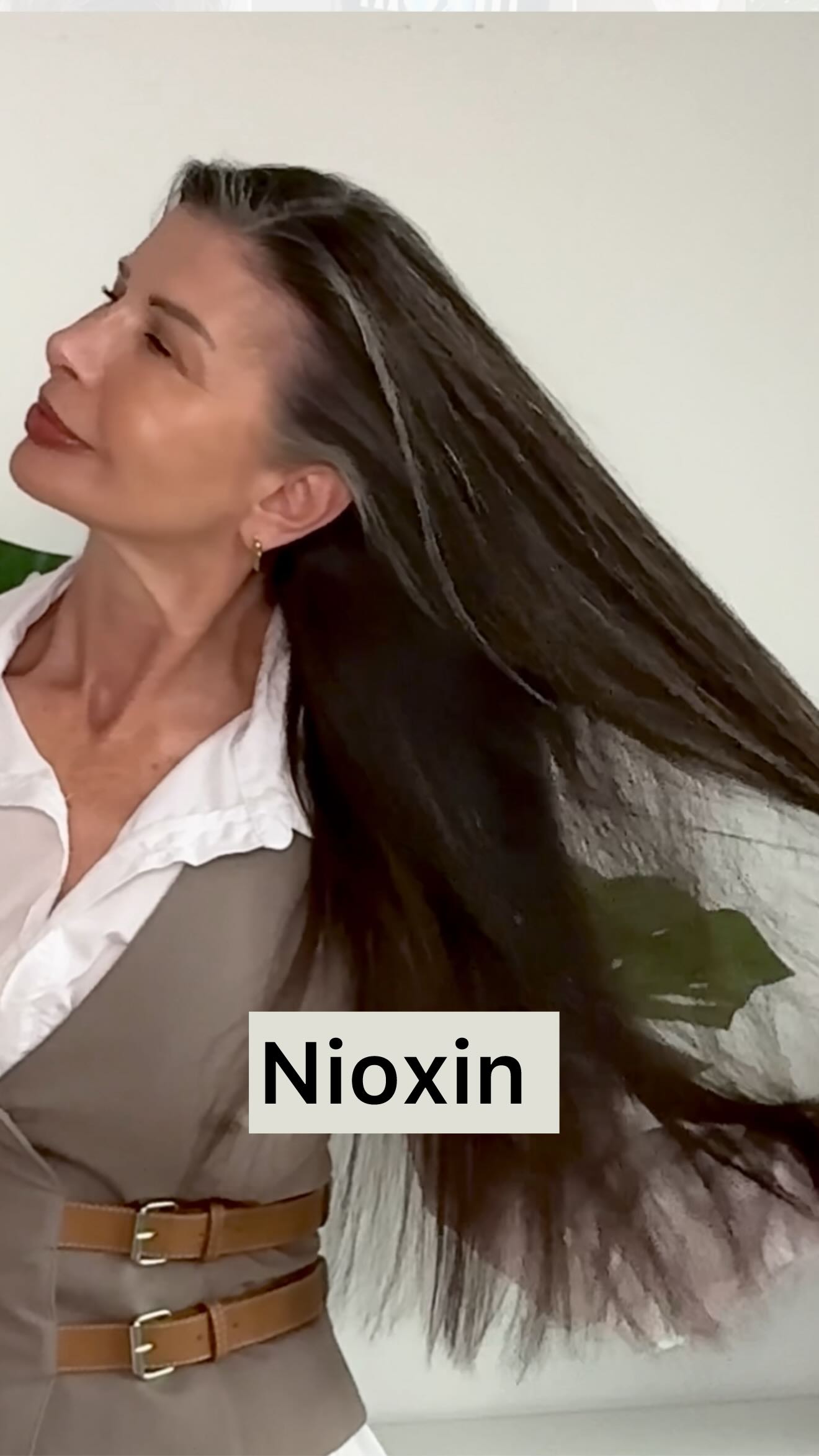 Instagram post by @violeta.zuvela for NIOXIN. Caption reads: Menopause wasn’t fun for me, and post-menopause....
