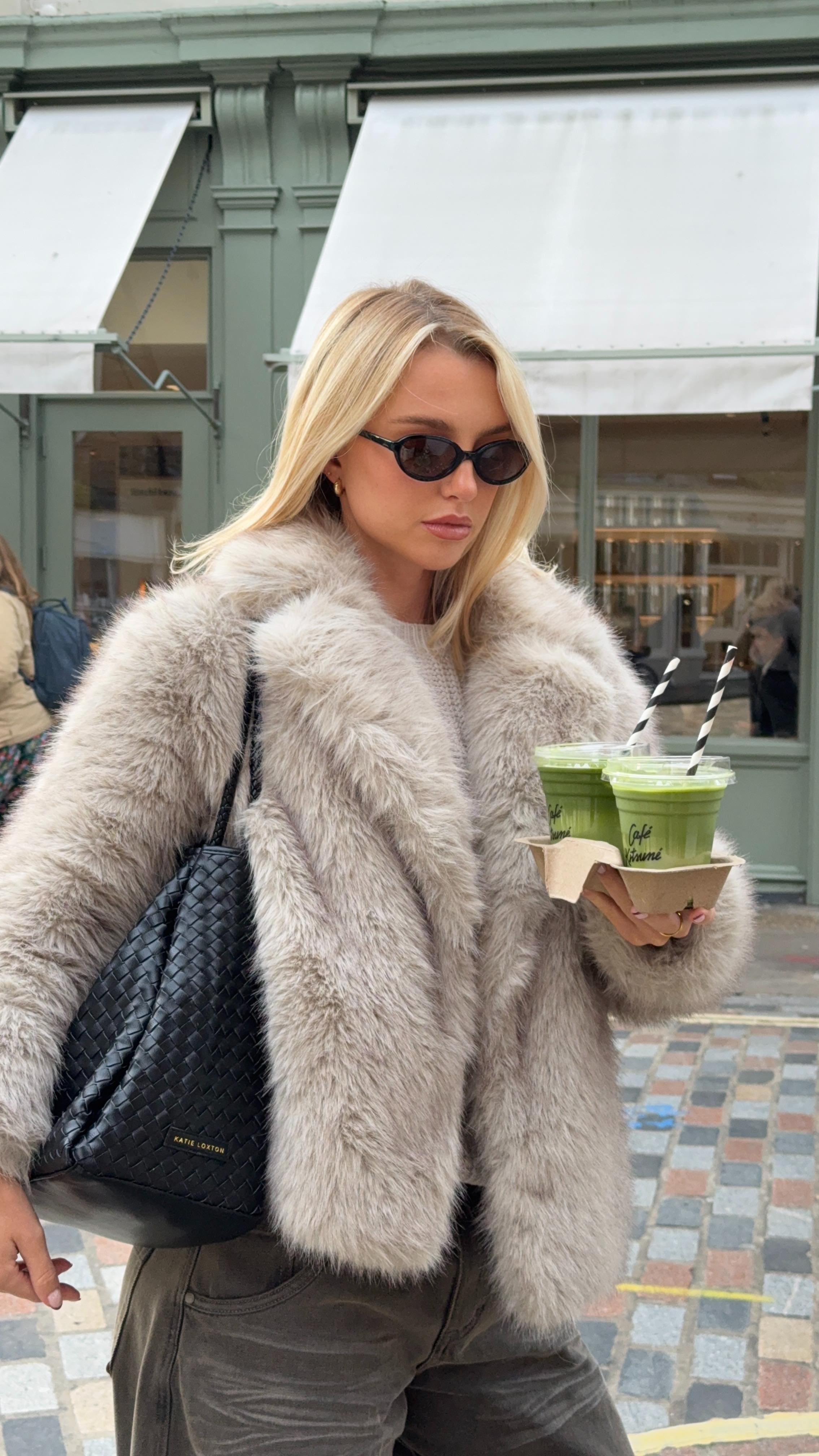 Instagram post by @cheyannekerr_ for Katie Loxton. Caption reads: A bag that fits everything but the kitchen sink....