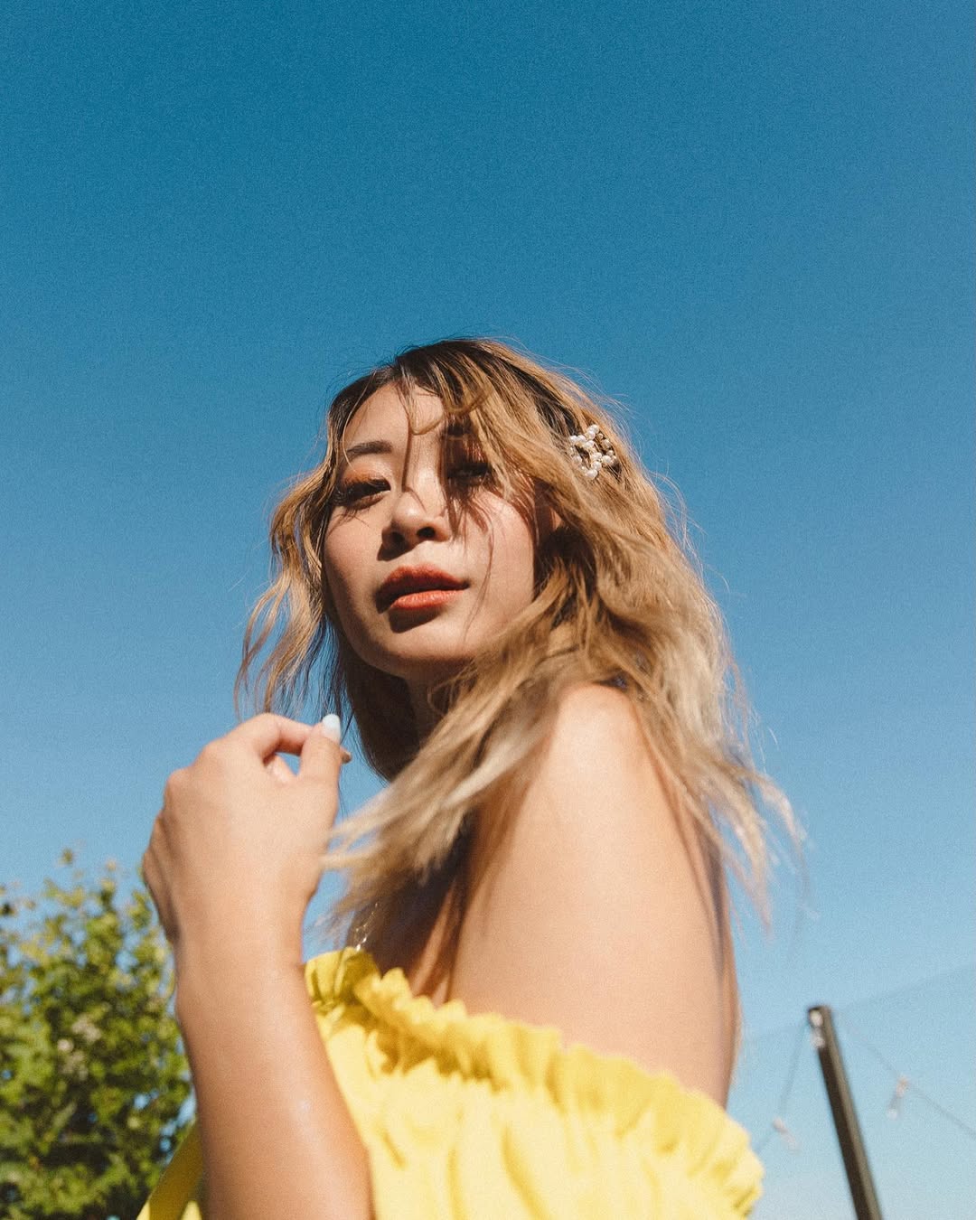 Instagram post by @lavendaire for Coola. Caption reads: #ad ☀️ I love the sun, but I always make sure to....