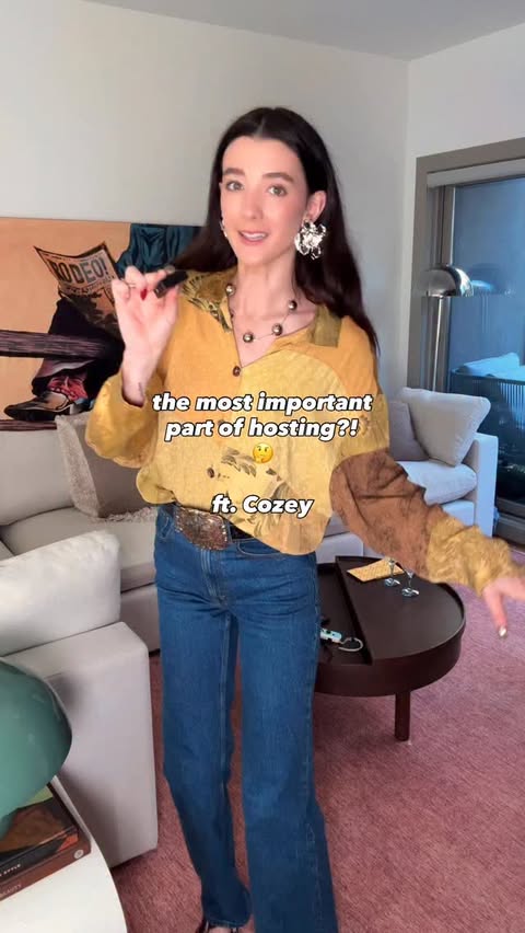 Instagram post by @andie.jey for Cozey. Caption reads: [...] cohost with the Ciello sofa AKA @cozey....