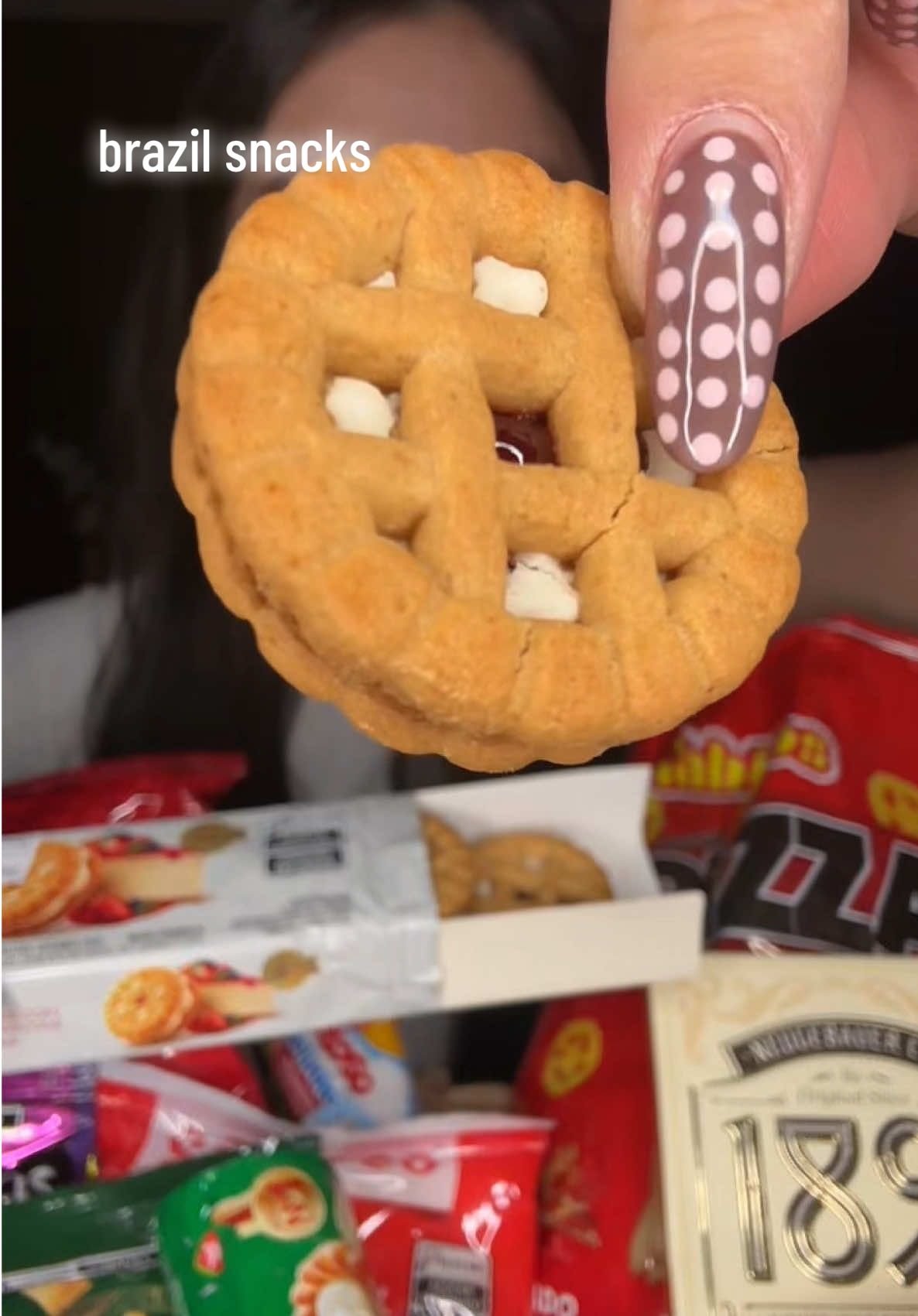 TikTok post by @sarah.slurps for Universal Yums. Caption reads: Snacks from BRAZIL 🇧🇷 from @Universal Yums !!....