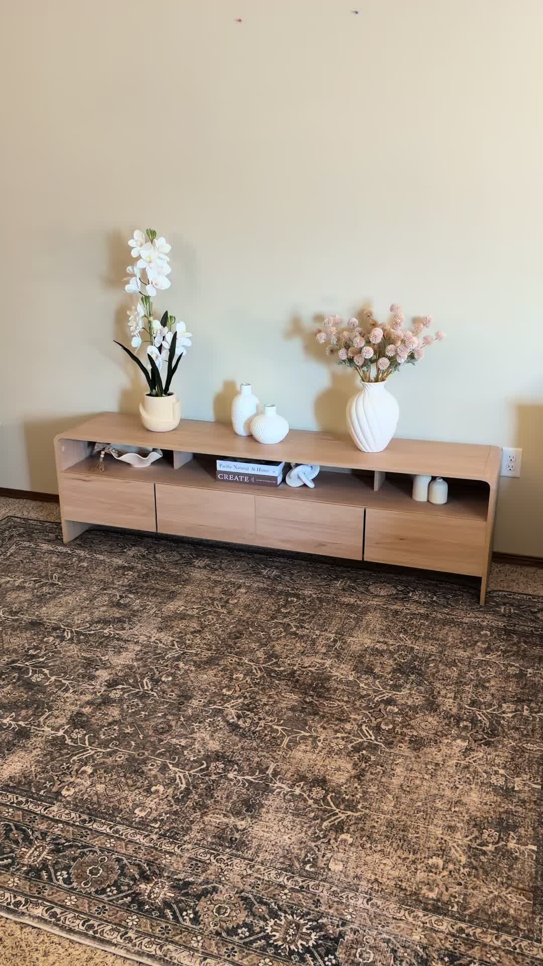 TikTok post by @nirusha.creates for Amerlife. Caption reads: [...] console that looks like a work of art....