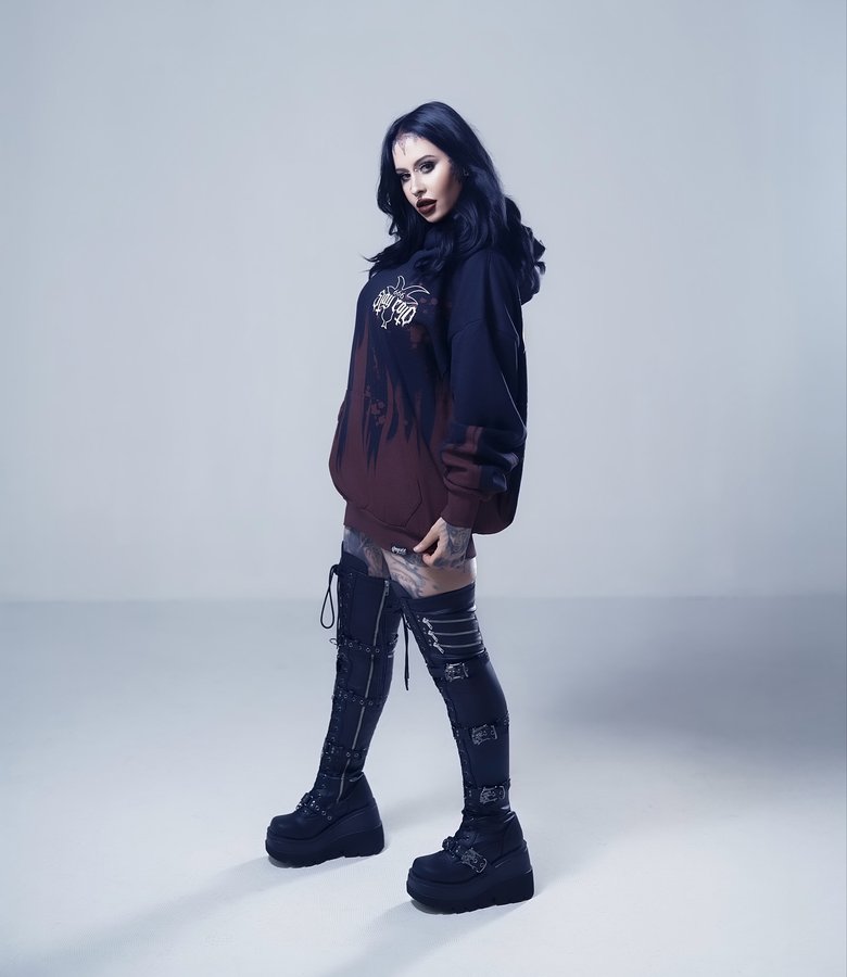 Instagram post by @heartandsoulblack for Demonia Shoes. Caption reads: ...𝚒𝚝 𝚋𝚎𝚐𝚒𝚗𝚜 𝚠𝚒𝚝𝚑 𝚒𝚜𝚘𝚕𝚊𝚝𝚒𝚘𝚗 -....