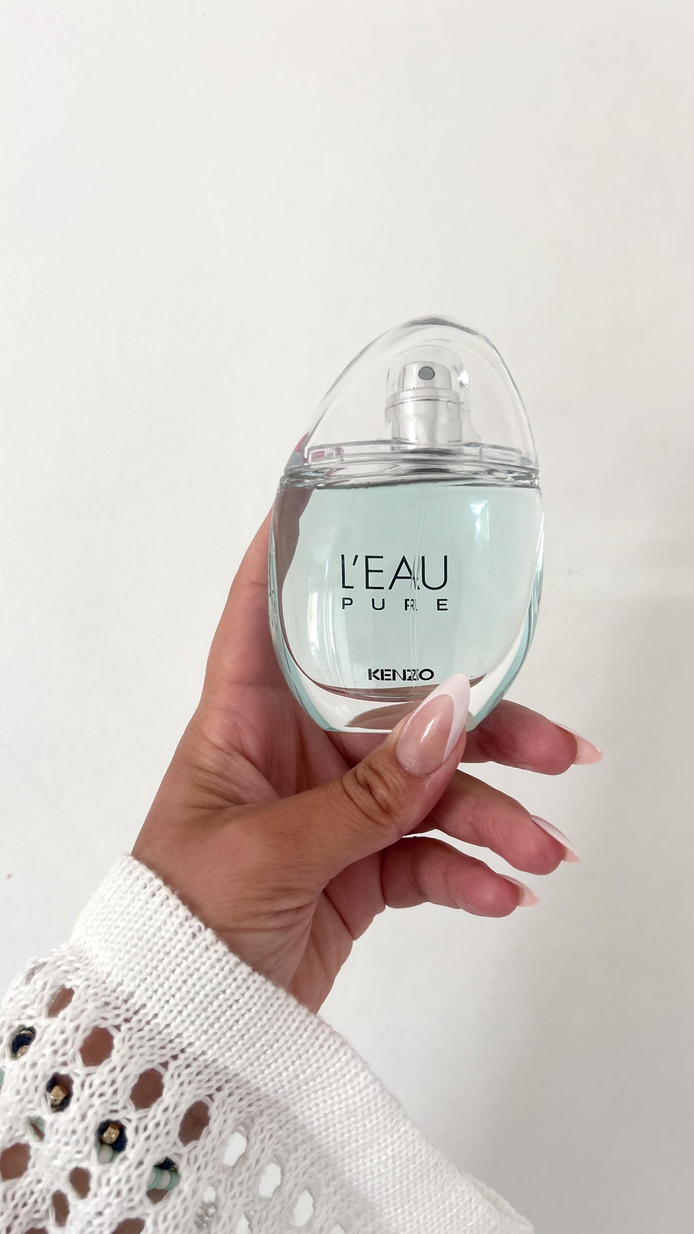 Instagram post by @soukaina.souuki for KENZO Parfums. Caption reads: Hello !! 🍋🍊☀️🧊 💦🚿🐚🌊

L’EAU PURE une....