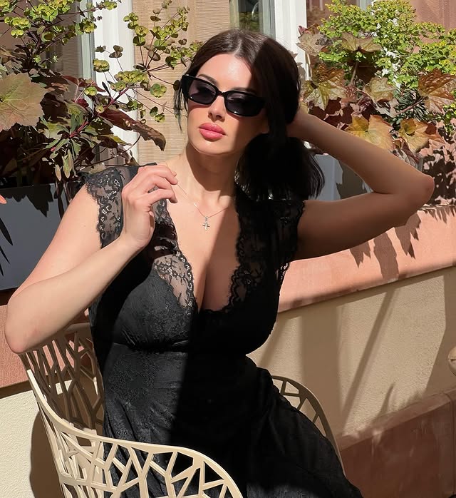 Instagram post by @tatiabukhgaltser for Popilush. Caption reads: Dress @popilush_au 🖤.