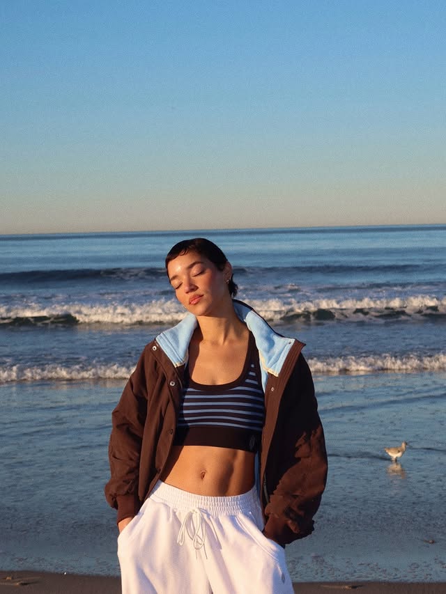 Instagram post by @tashimrod for FP Movement. Caption reads: Worn on repeat lately 🌊 @fpmovement....