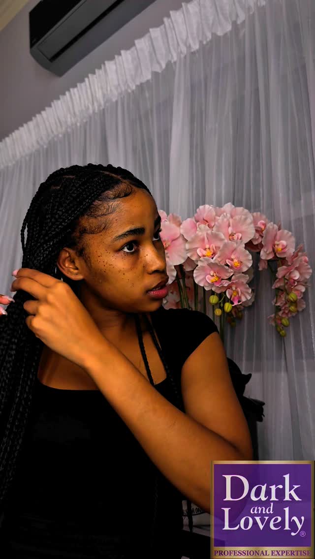 Instagram post by @roch.elly for Dark and Lovely. Caption reads: Let me show you how I revitalise my month long....