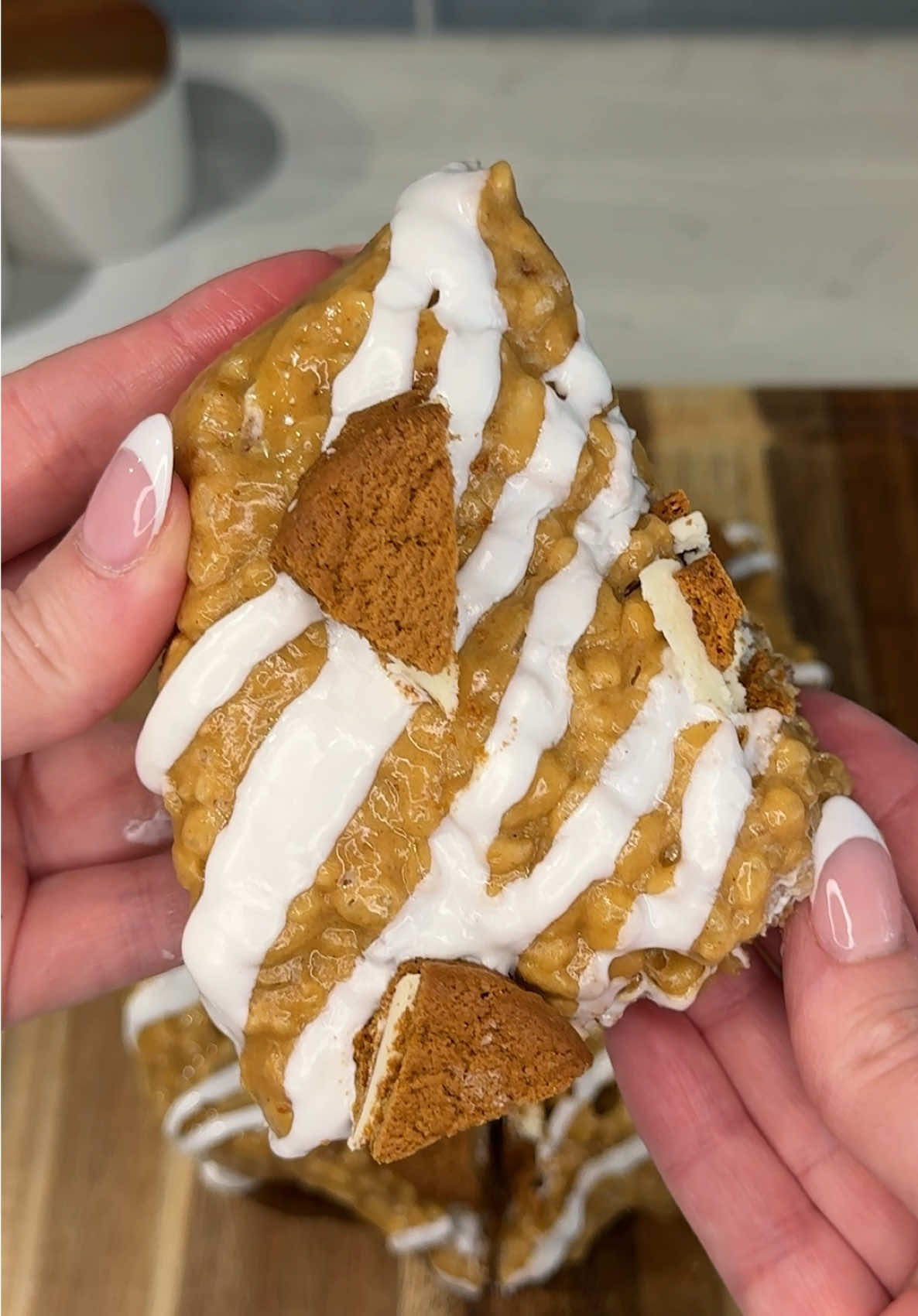 TikTok post by @ashleymarkletreats for Betty Crocker. Caption reads: these gingerbread rice krispies were the perfect....