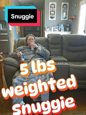 TikTok post by @kreidb11 for Snuggie. Caption reads: The Snuggie Weighted has 5 lbs of weighted comfort....