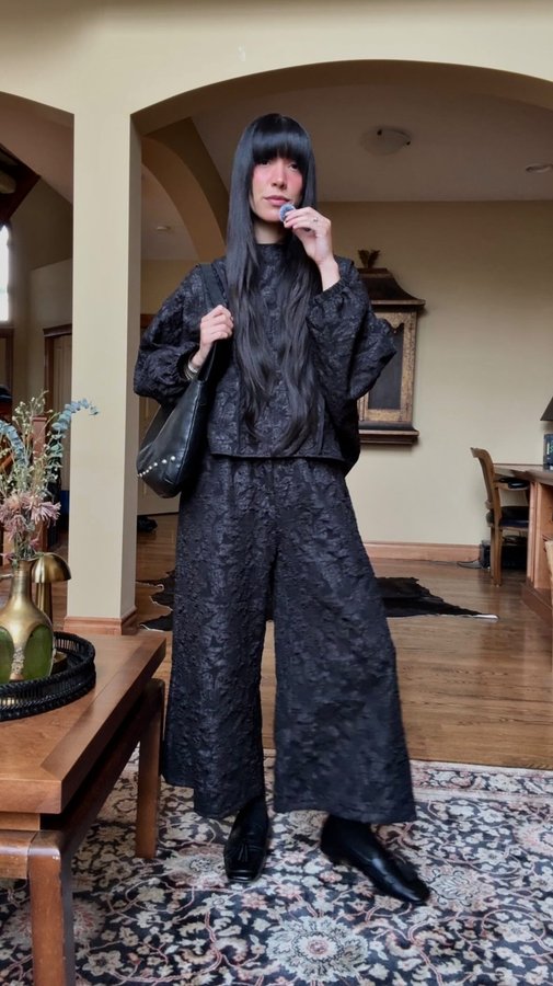 Instagram post by @itssaracroft for KATE HEWKO. Caption reads: Airport ootd featuring my new set from @katehewko....