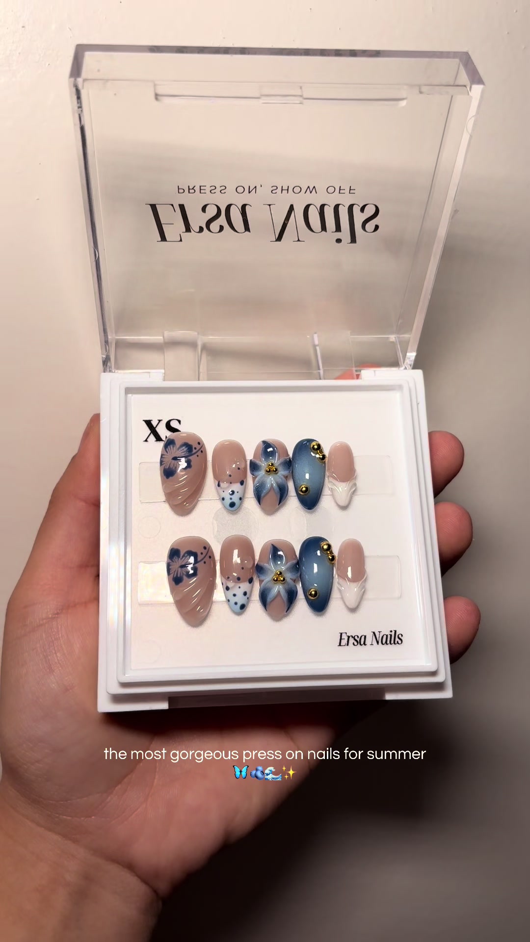 TikTok post by @nayeliguzmannn for Ersa Nails. Caption reads: [...] that I got these the wrong size 😓 @Ersa....