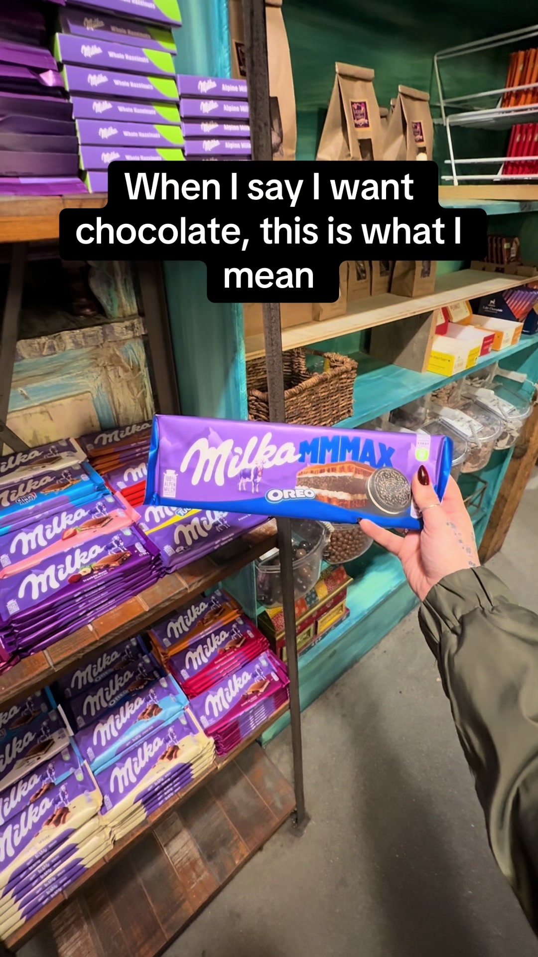 TikTok post by @itslivybabyy for Milka. Caption reads: [...] size of my head from this point on🤣🍫....