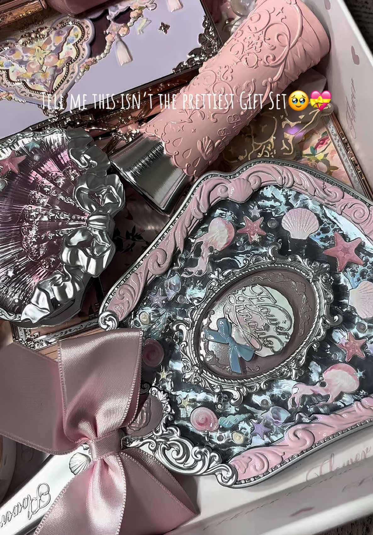 TikTok post by @gabiisanchezz for Flower Knows. Caption reads: [...] prettiest Gift Sets🥹💝 🌊🧜‍♀️ 🐚 @Flower....