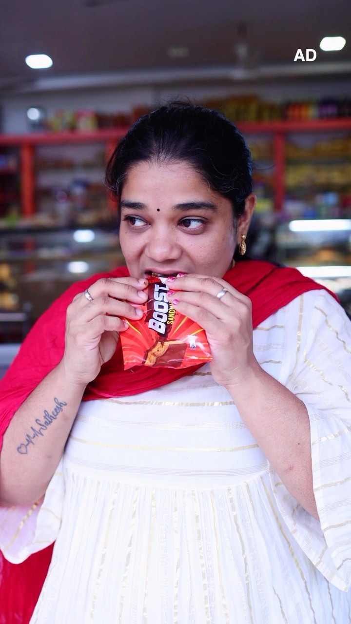 Instagram post by @yummytummyaarthi for Kwality Wall's. Caption reads: 🚀🍦 Remember your fav childhood Boost? You can....