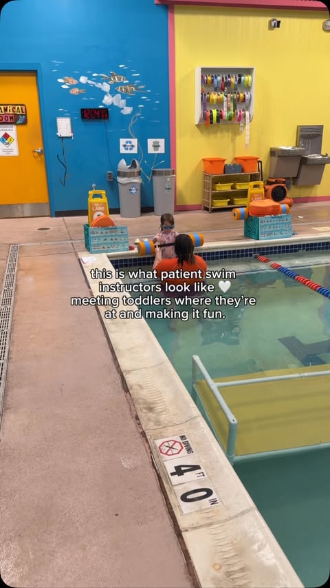 Instagram post by @themodernlatinamama for Goldfish Swim School. Caption reads: [...] the team at @goldfish_ashburn. -....