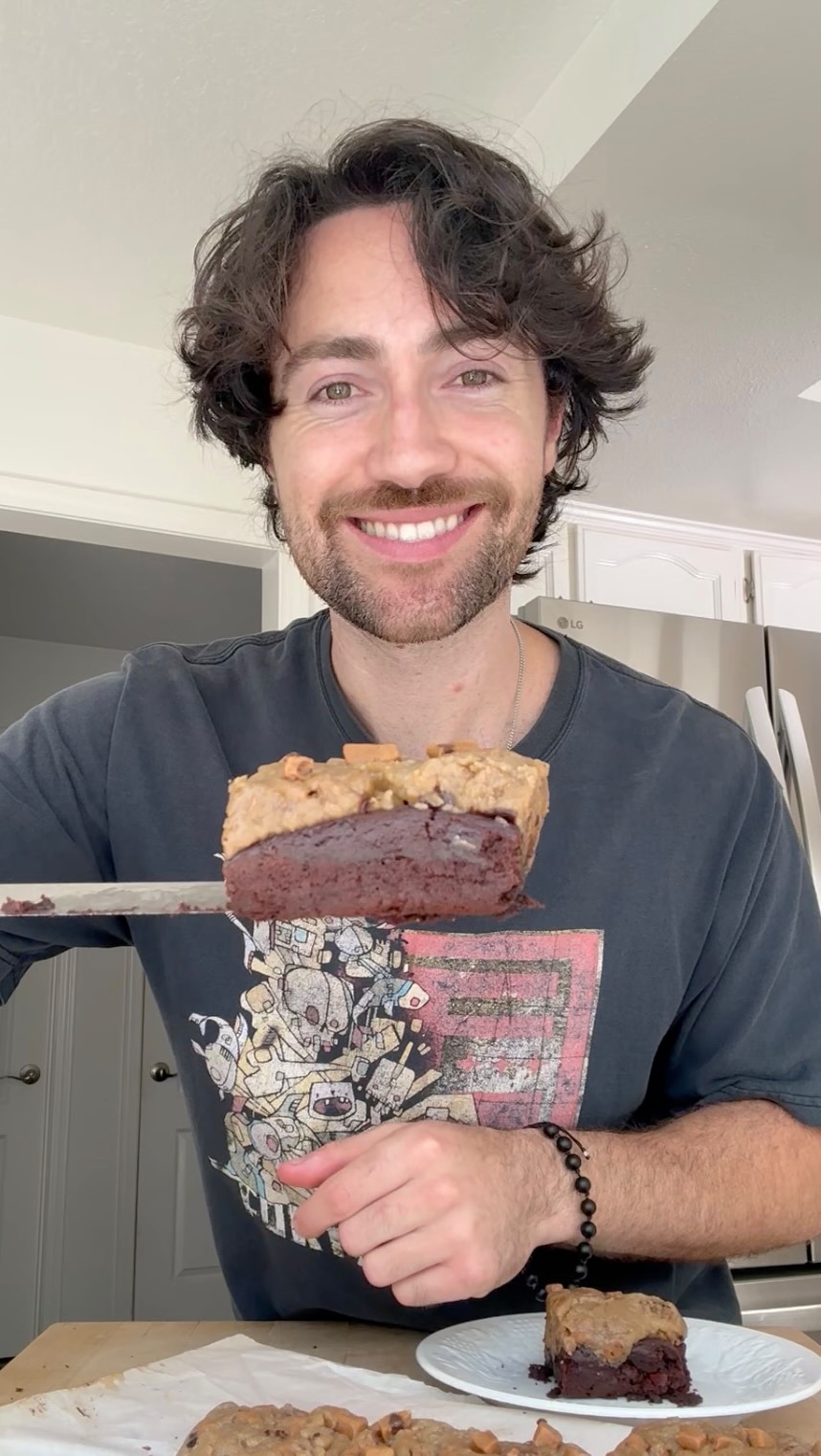 Instagram post by @justincooksgood for No Cow. Caption reads: Cookie Dough Brownies using @nocow protein snack....