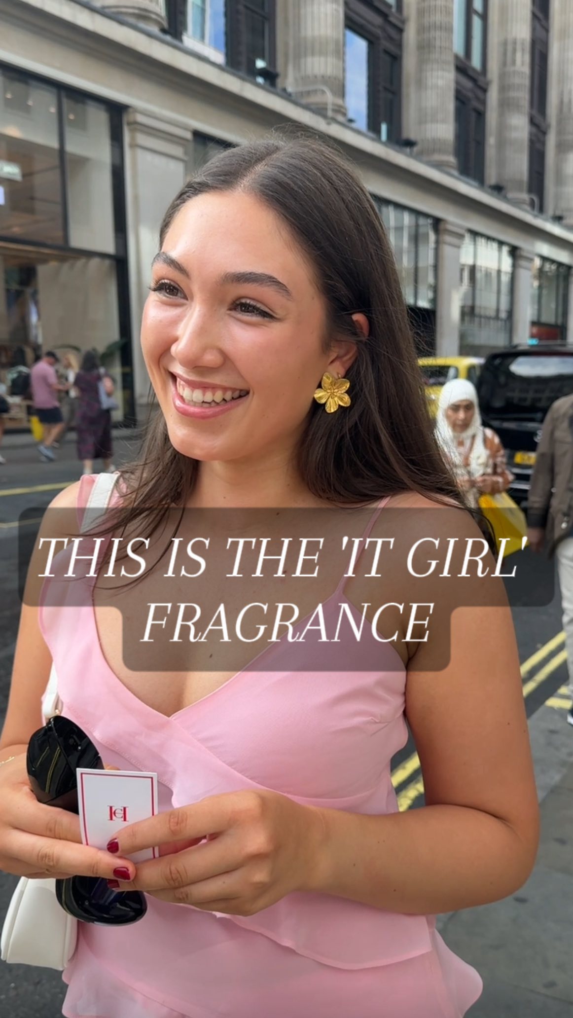 Instagram post by an influencer for CAROLINA HERRERA. Caption reads: [...] 'IT' girl fragrance 🦋👠 @carolinaherrera....