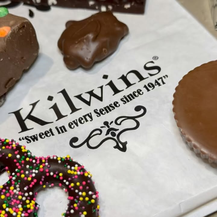 Instagram post by @foodiefun_adventures for Kilwins. Caption reads: This is your sign; you need a sweet treat!....