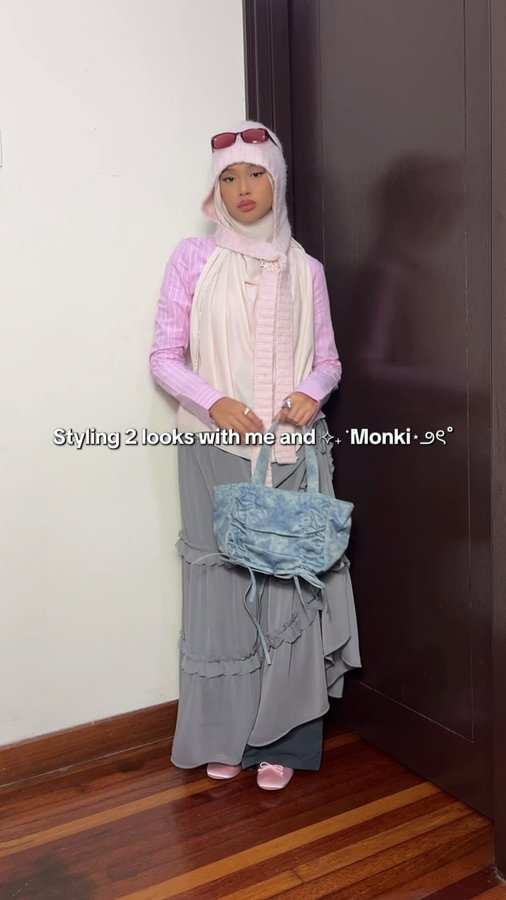 Instagram post by @qhouirunnisa for Monki. Caption reads: Serving looks, confidence, and a little bit of....