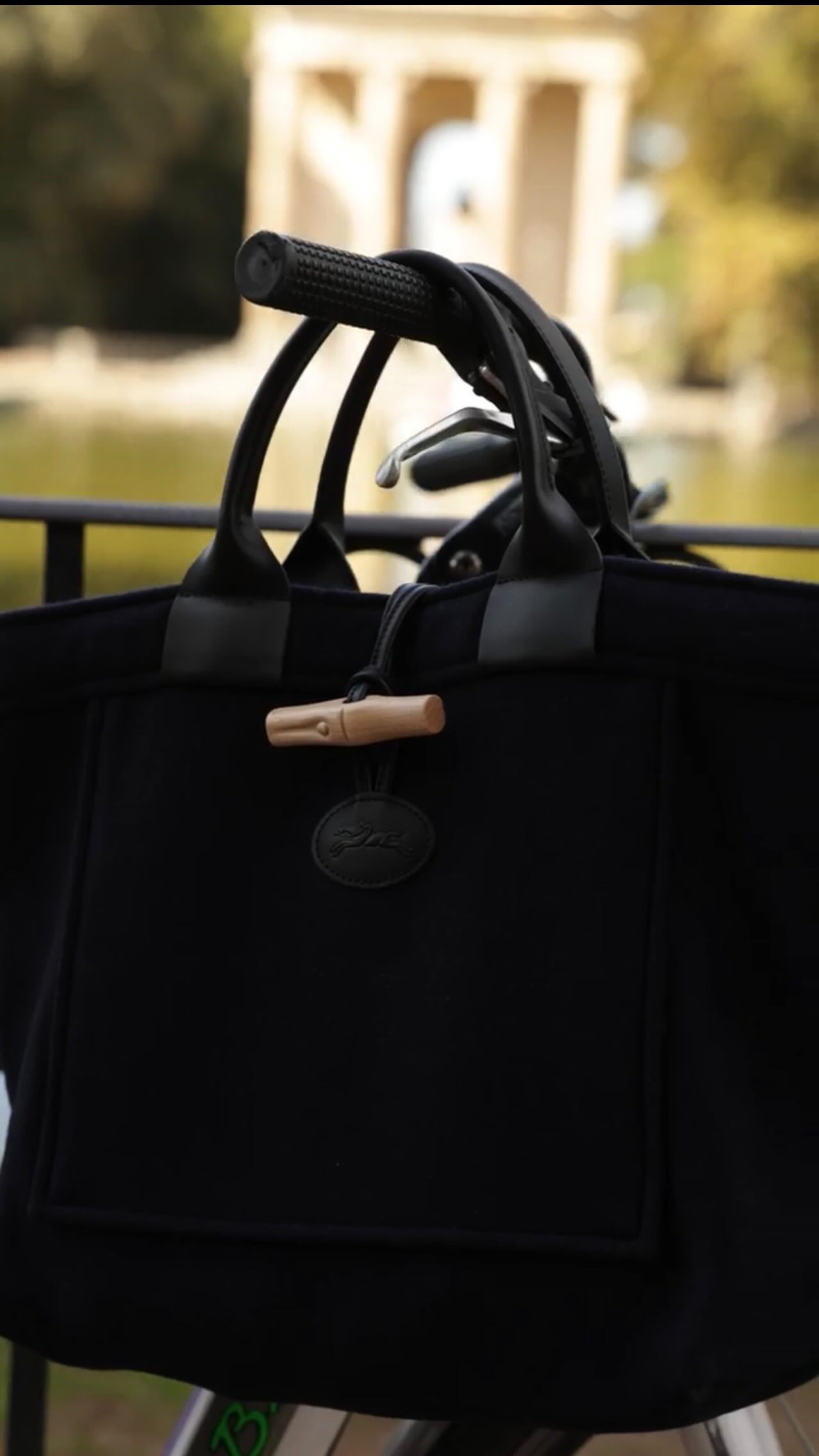 Instagram post by @laviniaguglielman for Longchamp. Caption reads: timeless, with a twist of bamboo @longchamp....