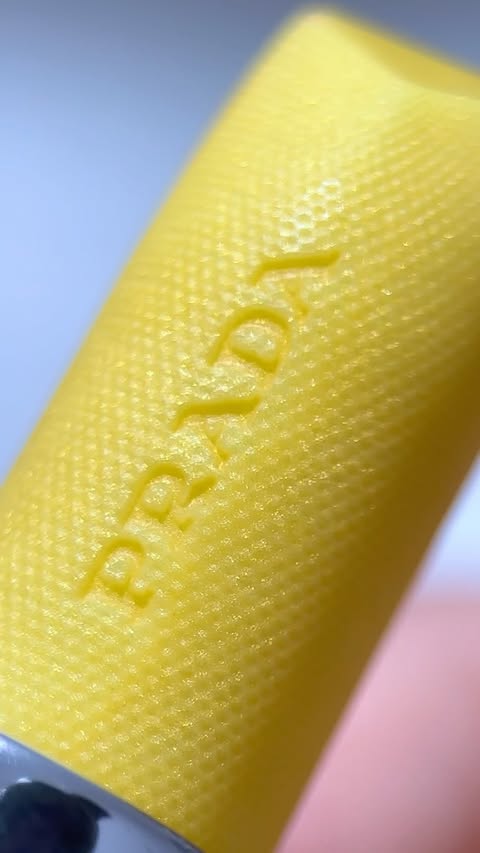 Instagram post by @marinanalha for LOOKFANTASTIC. Caption reads: [...] in your opinion? Get @pradabeauty on....