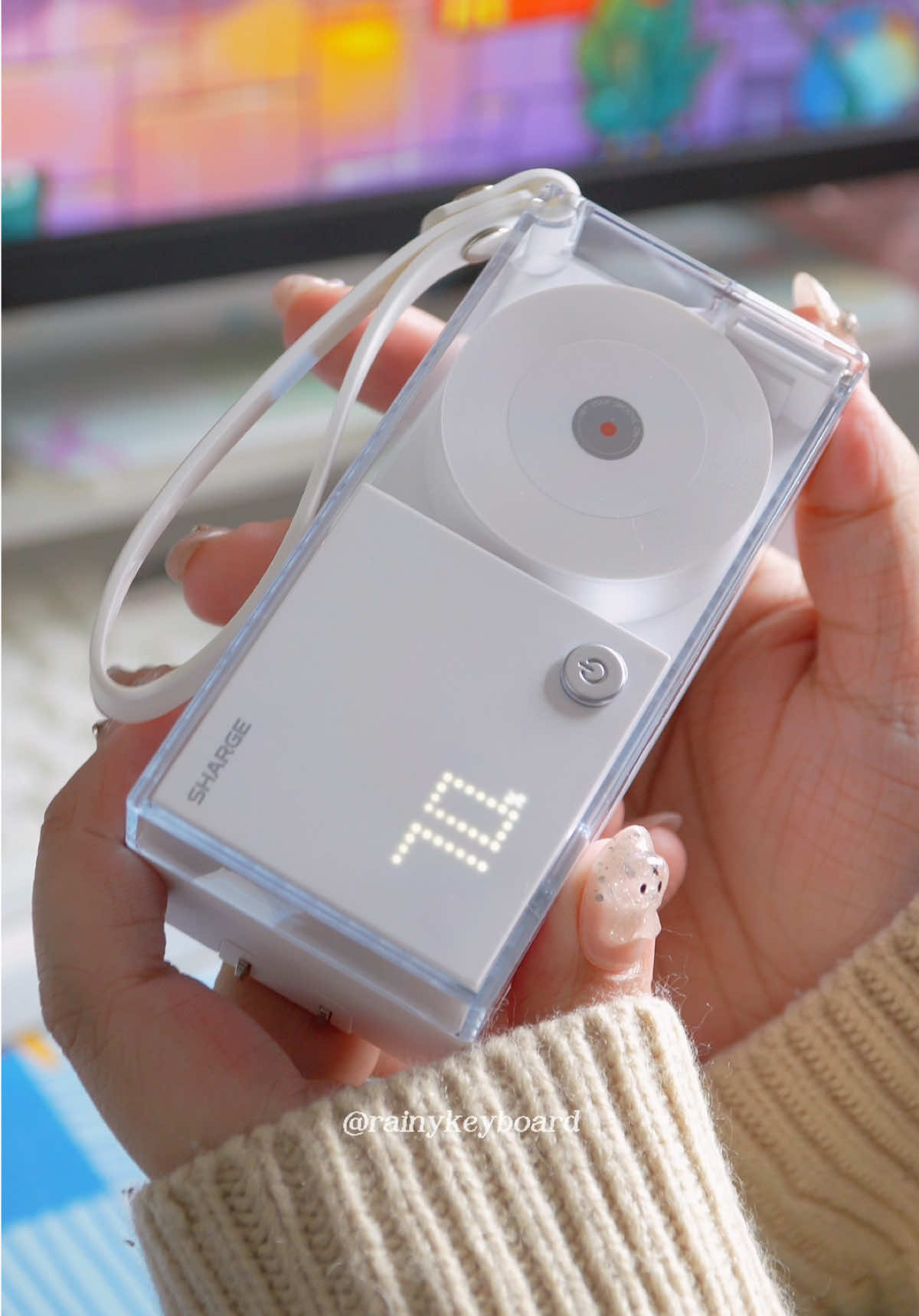TikTok post by @rainykeyboard for Sharge. Caption reads: retractable 3-in-1 powerbank by @SHARGE !!....