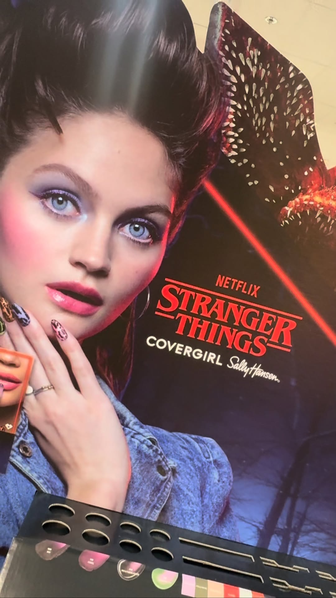 Instagram post by @thehawkinsreporter for Sally Hansen. Caption reads: COVERGIRL X STRANGER THINGS

Stranger Things is....