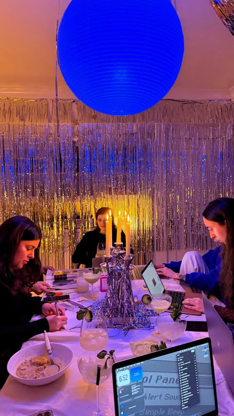 Instagram post by @foodiesnitch for Evite. Caption reads: [...] by silver tinsel, candlelight and @evite !....