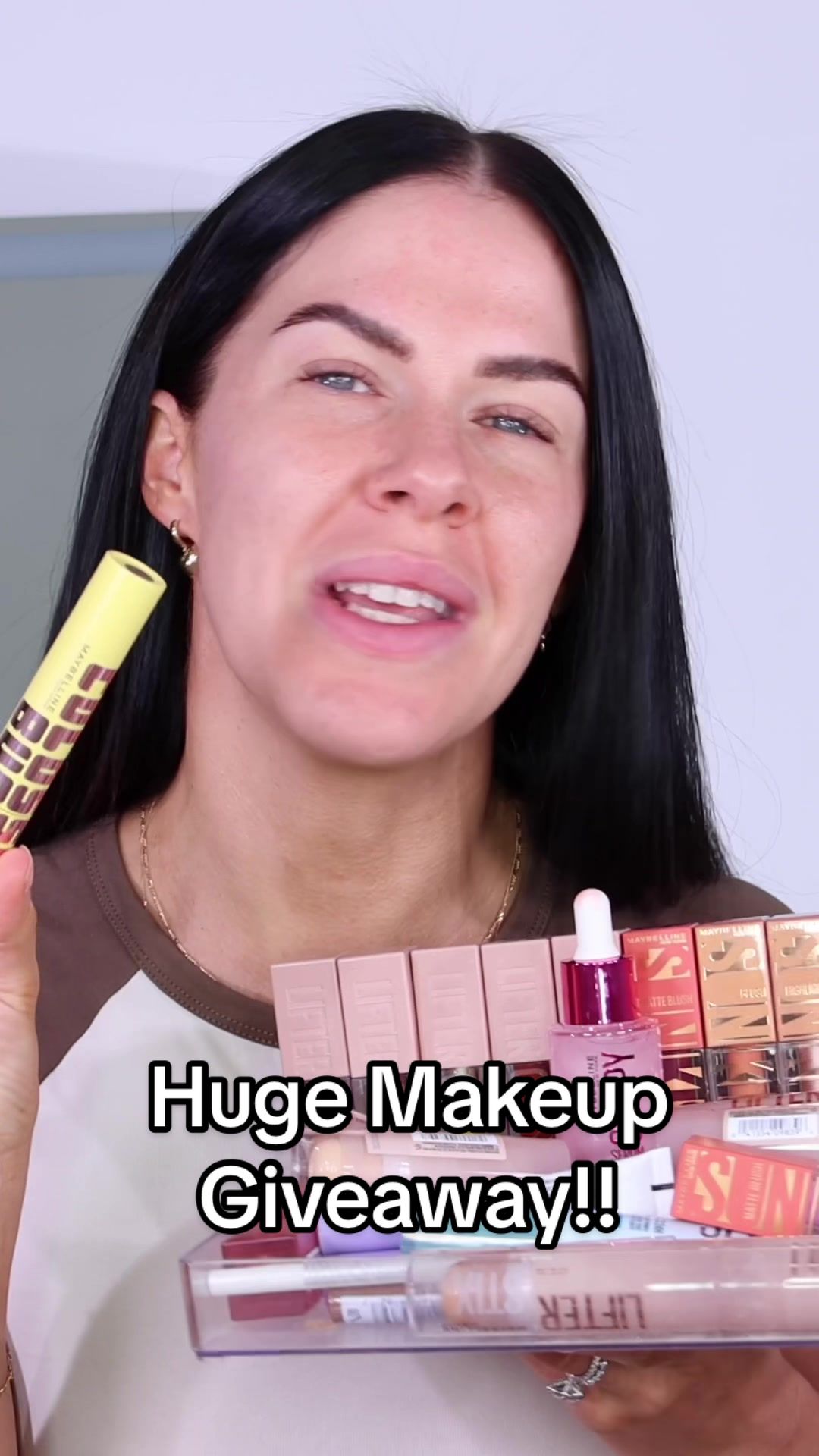 TikTok post by @nikkiajoy for Chemist Warehouse. Caption reads: HUGE MAKEUP GIVEAWAY!!!😱 Maybelline have dropped....