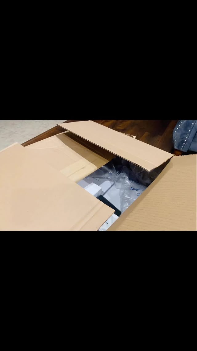 Instagram post by @sheraseven for Brandon Blackwood. Caption reads: So exciting! Unboxing my #brandonblackwood #niabag....