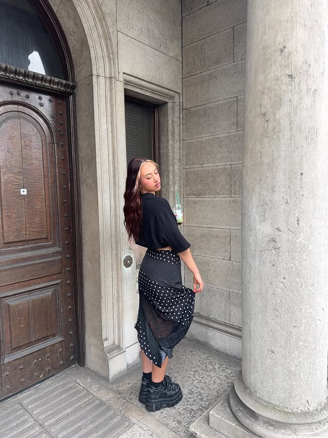 Instagram post by @_katiepepper for Cider. Caption reads: [...] 🖤🤍 Outfit Details - Skirt - @shopcider *....