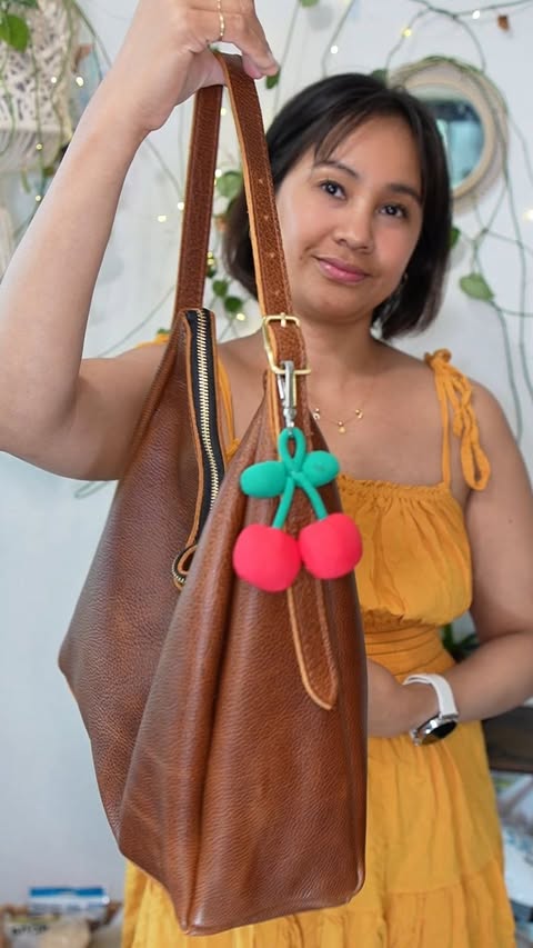 Instagram post by @willworkformascara for Portland Leather Goods. Caption reads: [...] applies automatically 💫 🛍️....