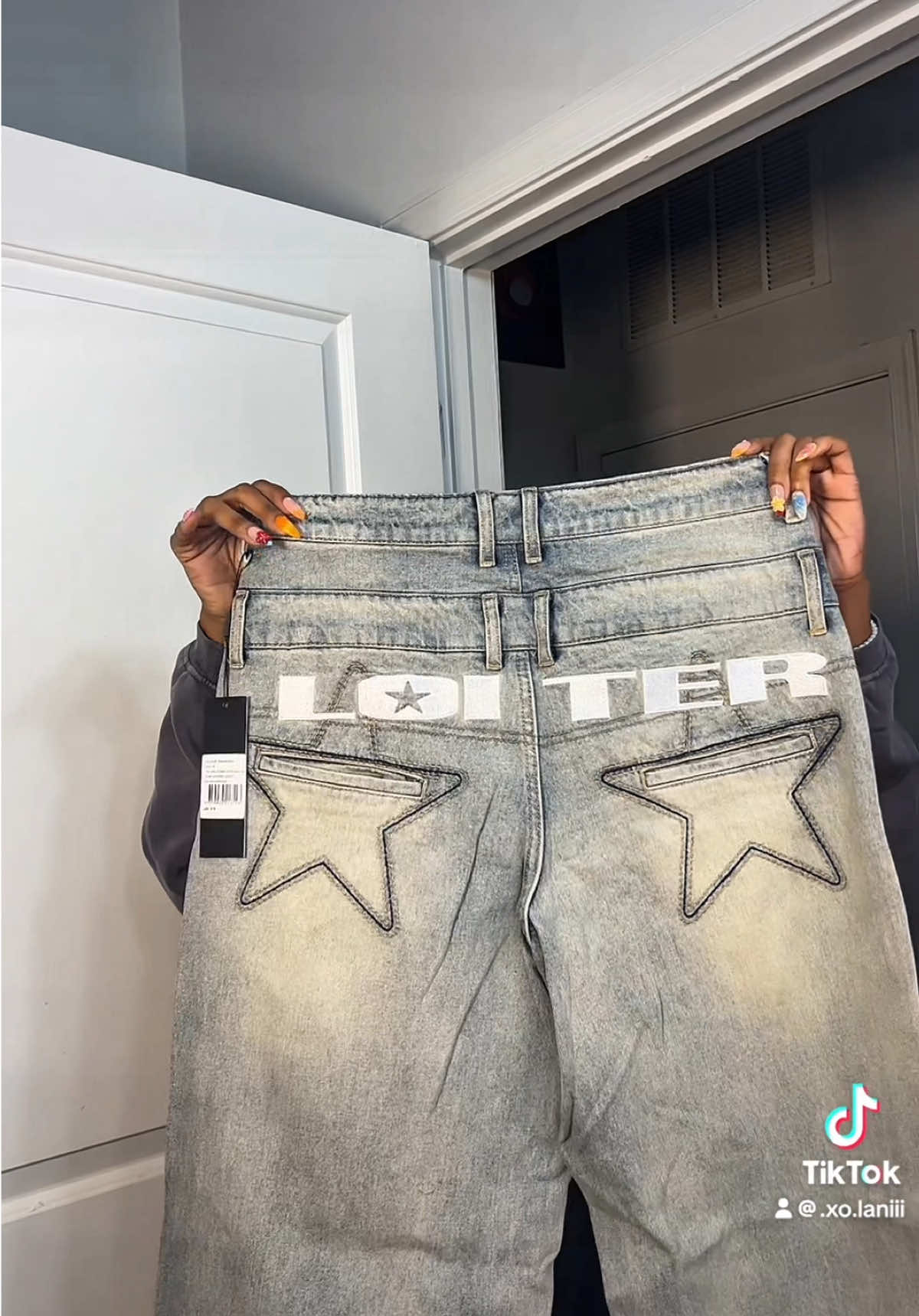 TikTok post by @.xo.laniii for Culture Kings. Caption reads: @Culture Kings Loiter Star Layered Jeans😍😱 [...].