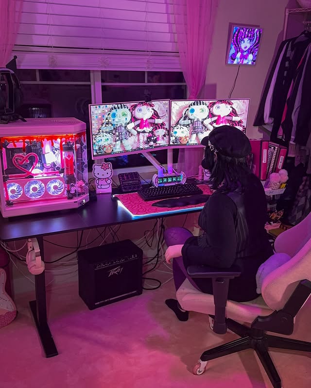 Instagram post by @v4mpire.doll for Pixio Gaming. Caption reads: @pixiogaming 🖥️ gifted me an all pink✨🌸setup....